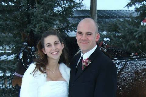 Here is a bride we provided for. Don't they look great and happy!? She is wearing our long sleeve faux fur bolero for her winter wedding. They ordered from www.spazooie.com