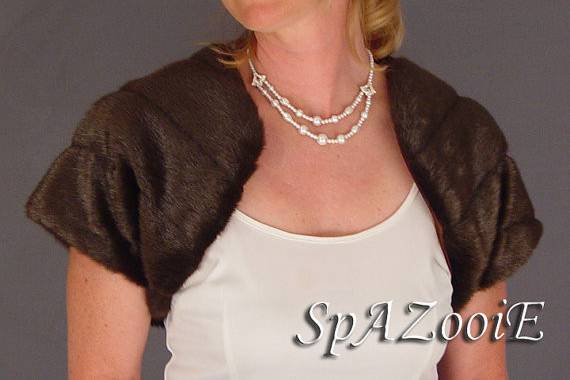 Short sleeve brown pelted mink faux fur bolero. Available in all colors and great for your brides maids in brown but white for you in all white!