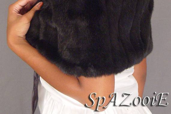 Black pelted mink shrug with a bow. Perfect for your brides maids and get a white one for yourself!