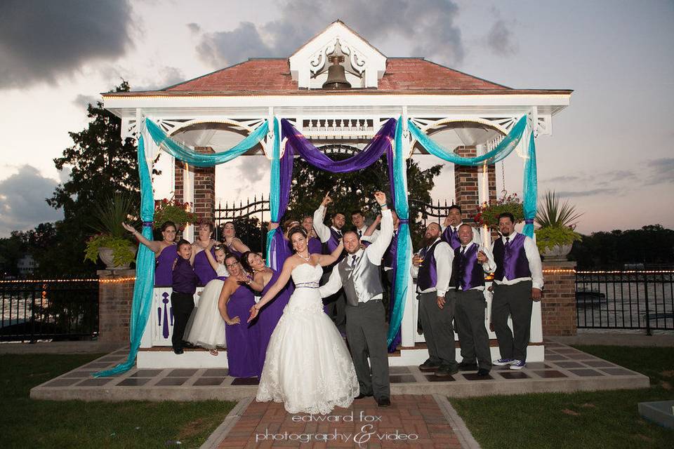 couple with bridesmaid and groomsmen