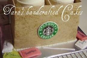 3D carved Starbucks cake. Fondant coffee carrier, chocolate lids and sugar packets, hand painted gum paste logo.