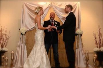 Couple with officiant