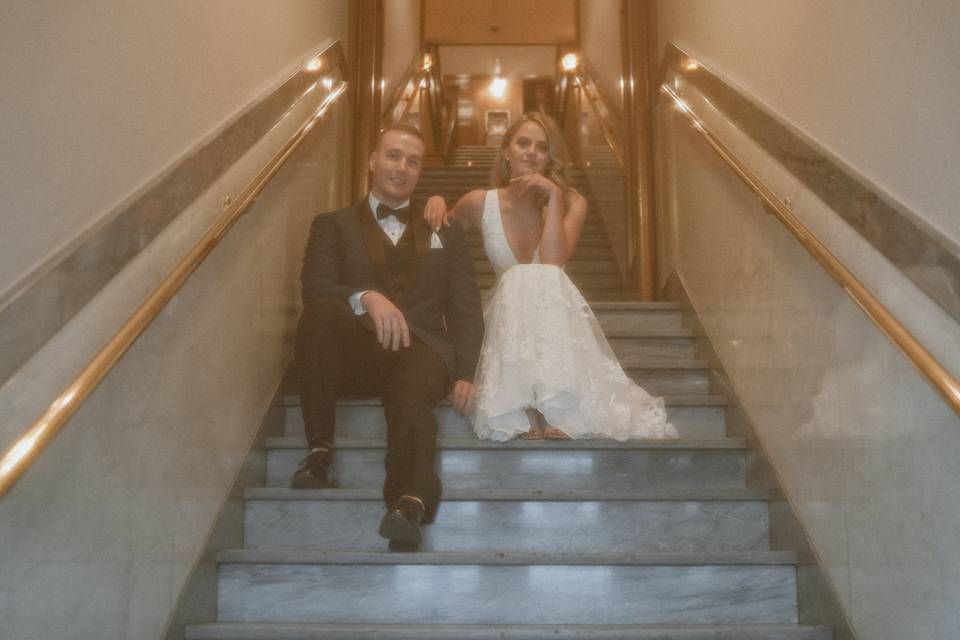 Bride and groom sitting