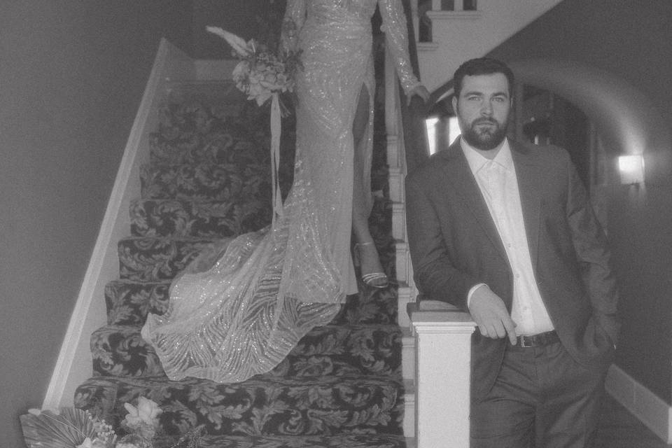 Bride and groom on stairs
