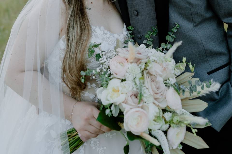 Newlyweds in a field