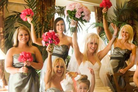 The bride with her bridesmaids and flower girl