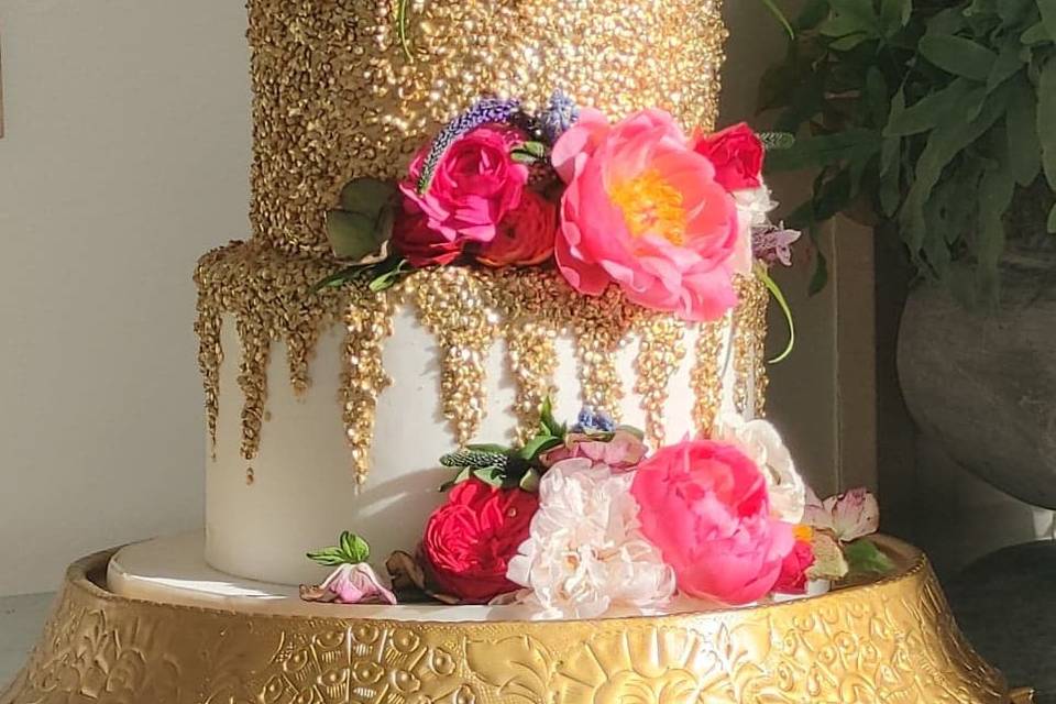 Gold sequins over fondant