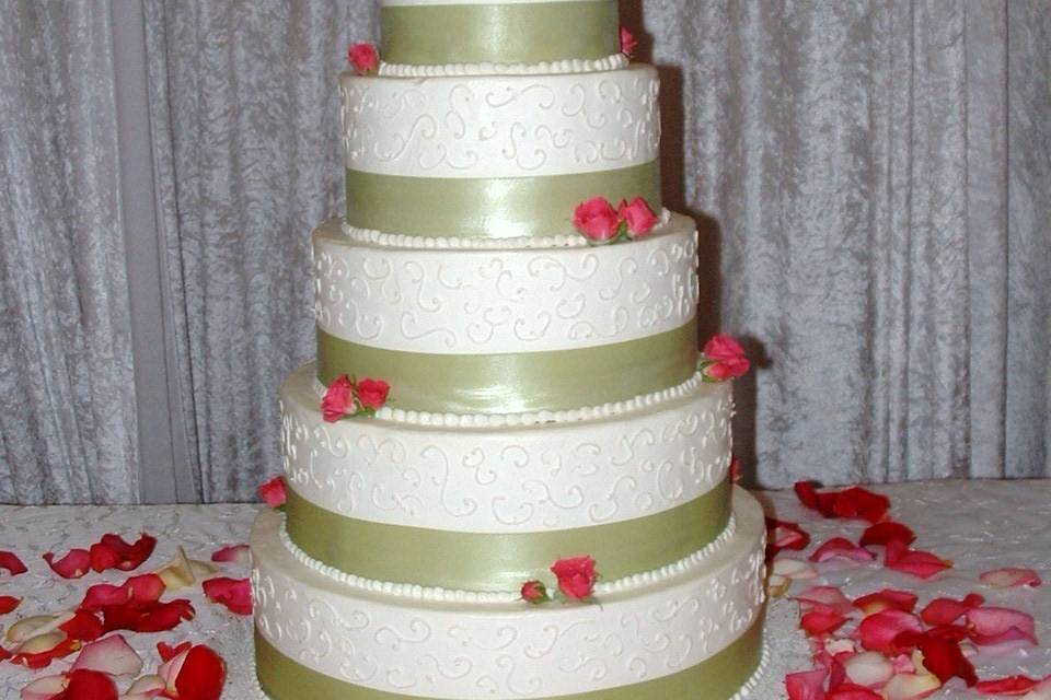White cake with apple green linings