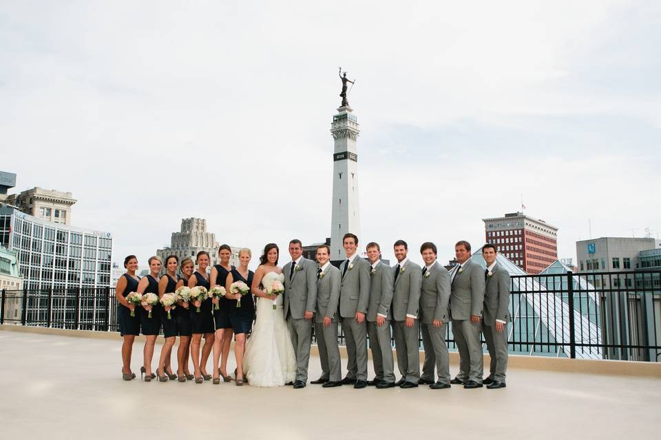 The couple with the bridesmaids and groomsmen