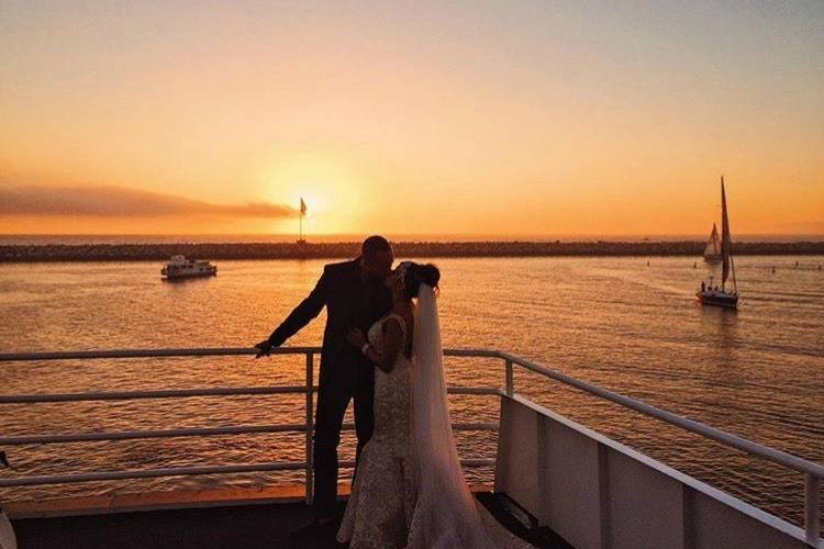 Newlyweds admiring the sunset