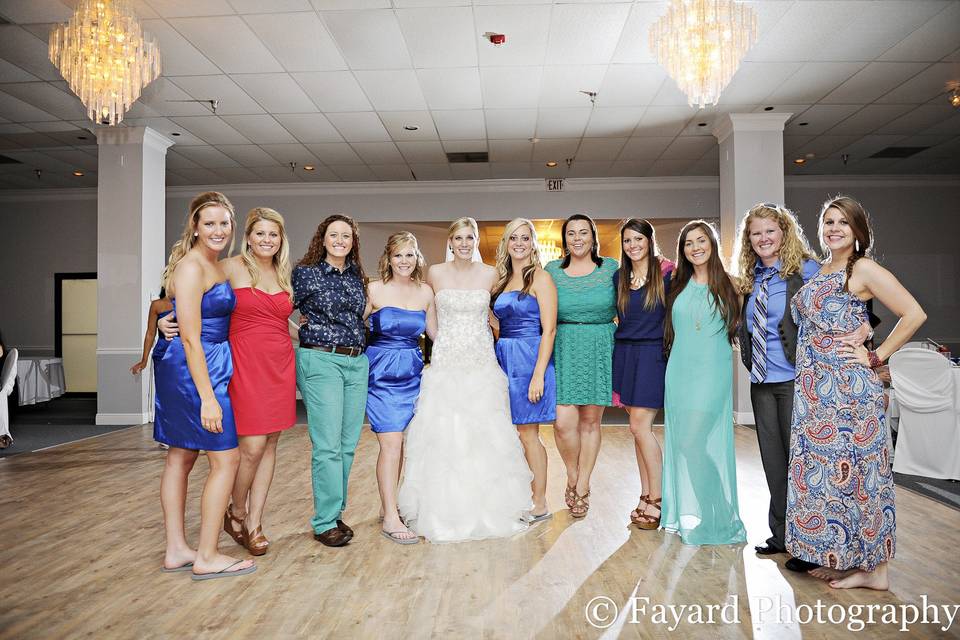 The bride with her bridesmaids and guests'