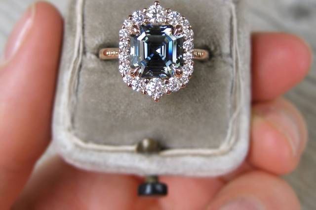 The Rosalind, an iconic grey asscher cut moissanite center and diamond accents