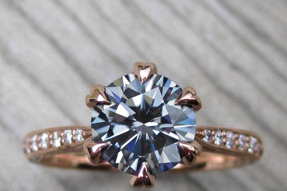 The Camille, an iconic grey moissanite center and diamond accents