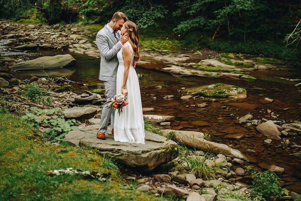 Lovely couple by the creek