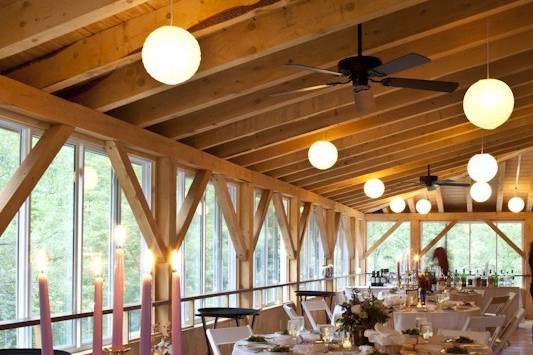 Wedding guests celebrating in the barn