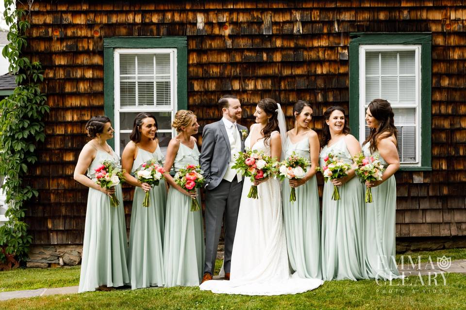 The groomsmen enjoy the outdoors and let loose before the reception in the pavilion