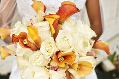 Bridal dress and fall bouquet