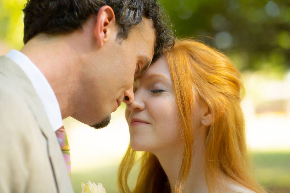 Bride and groom foreheads