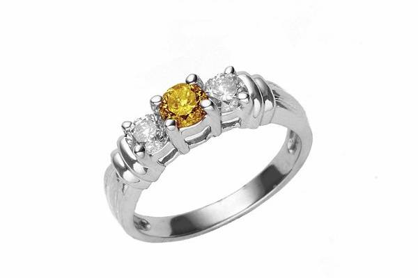 Photo of our yellow diamond in a ring setting. We  do offer settings for your diamonds.