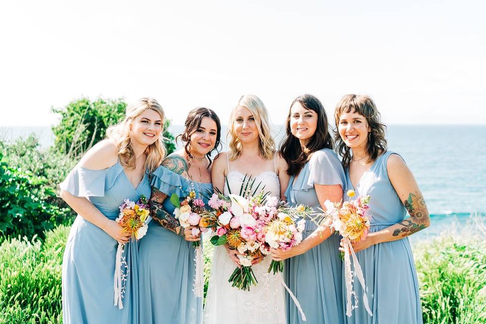 Bright flowers held by wedding party