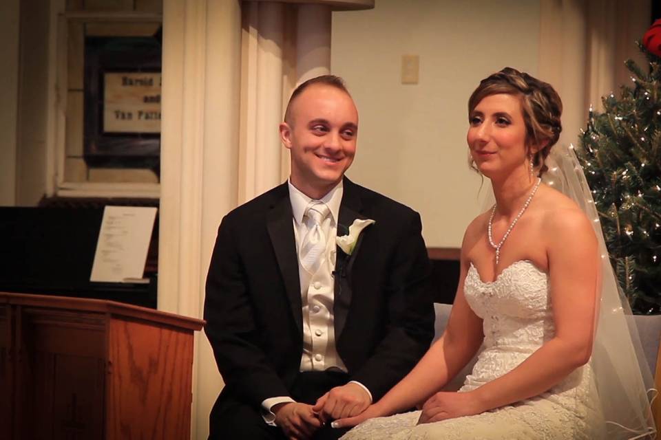 A video still of the wedding ceremony