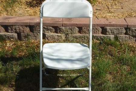 Wedding White vinyl folding chair with steel frame.