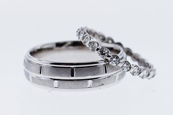 Large selection of wedding bands in all the popular metals -gold, platinum, palladium, titanium, tungsten and colbalt. Something for everyone's taste.
