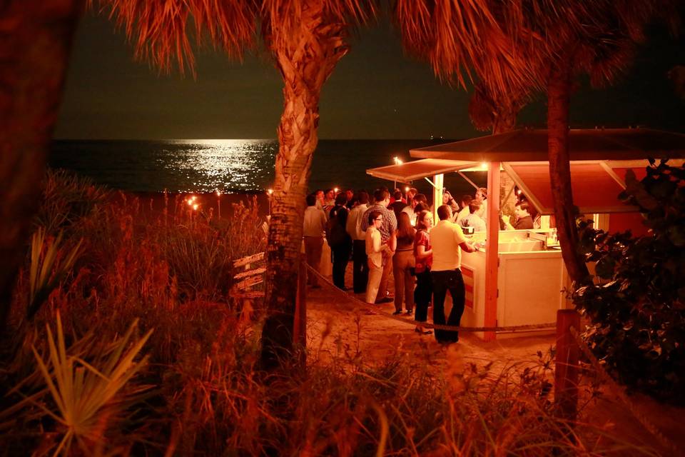 Dinner party on the beach during full moon