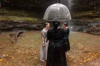 I will stand in the rain.