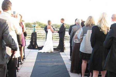 Orlando Science Center Wedding.Hand painted white T on black fabric.