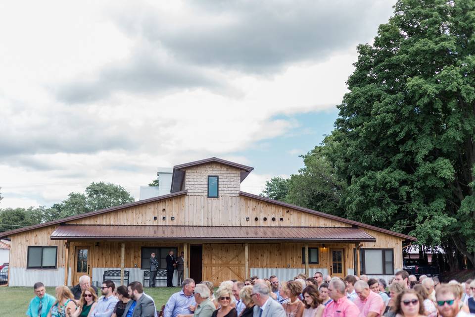 Outdoor Ceremony with Lodge