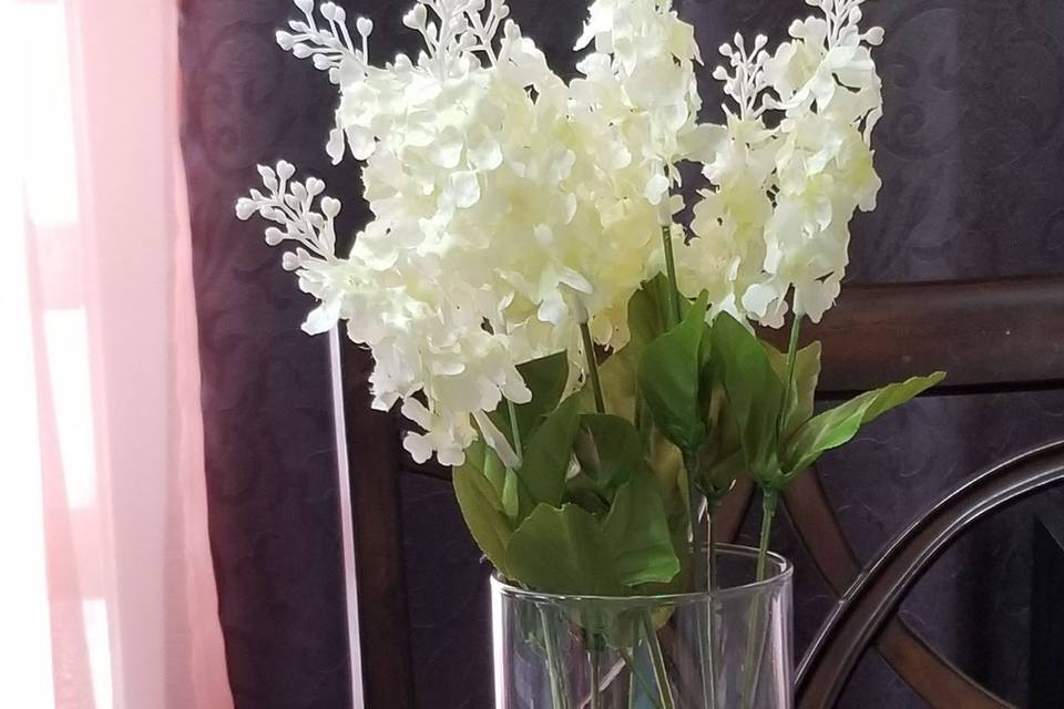 Floral table centerpiece with green lights