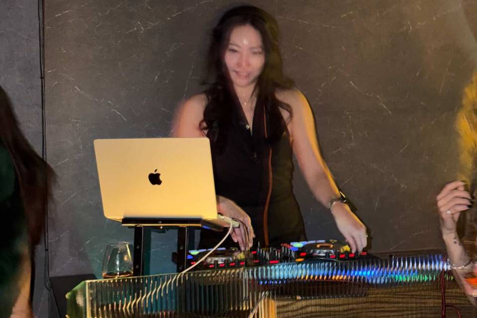 DJ Kimmy spinning at Musaek