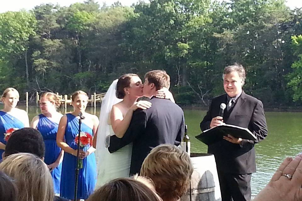 The magic moment... Officiating a wedding at the beautiful Slack Winery in Ridge, Maryland.