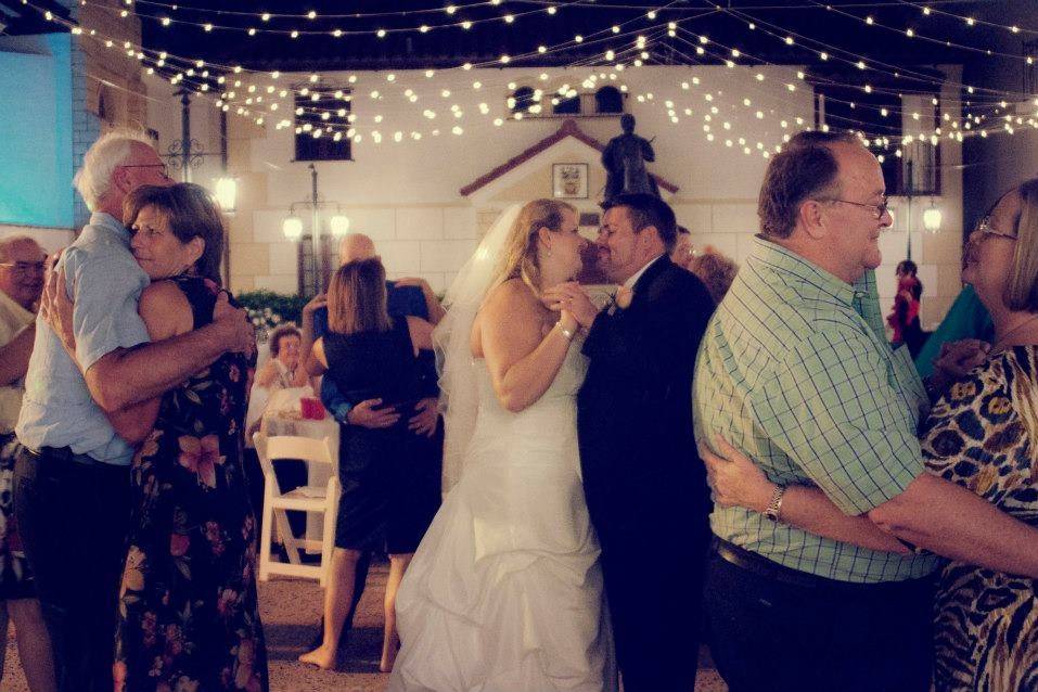 Couple dancing with the guests