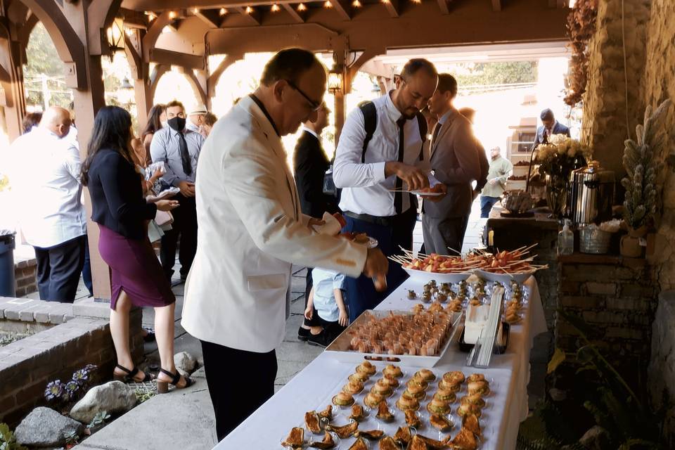 Guests enjoying appetizers