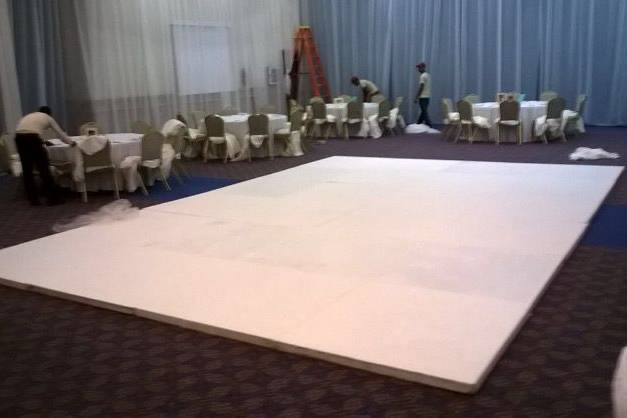 White wooden dance floor in ballroom