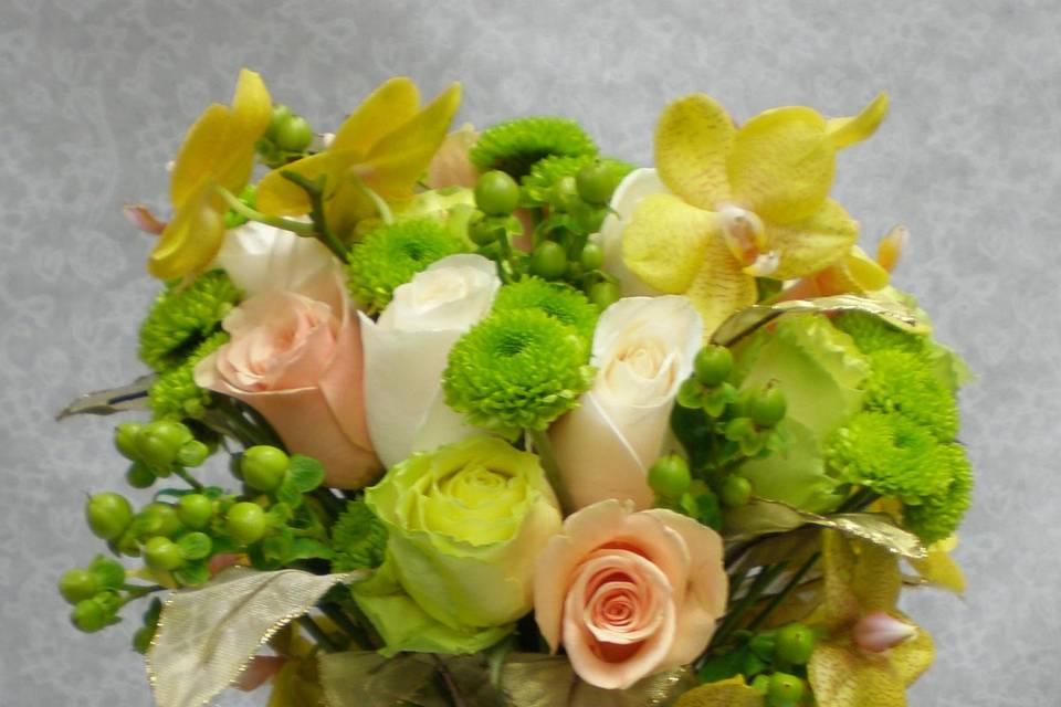 Roses, orchids and kermit poms with hypericum