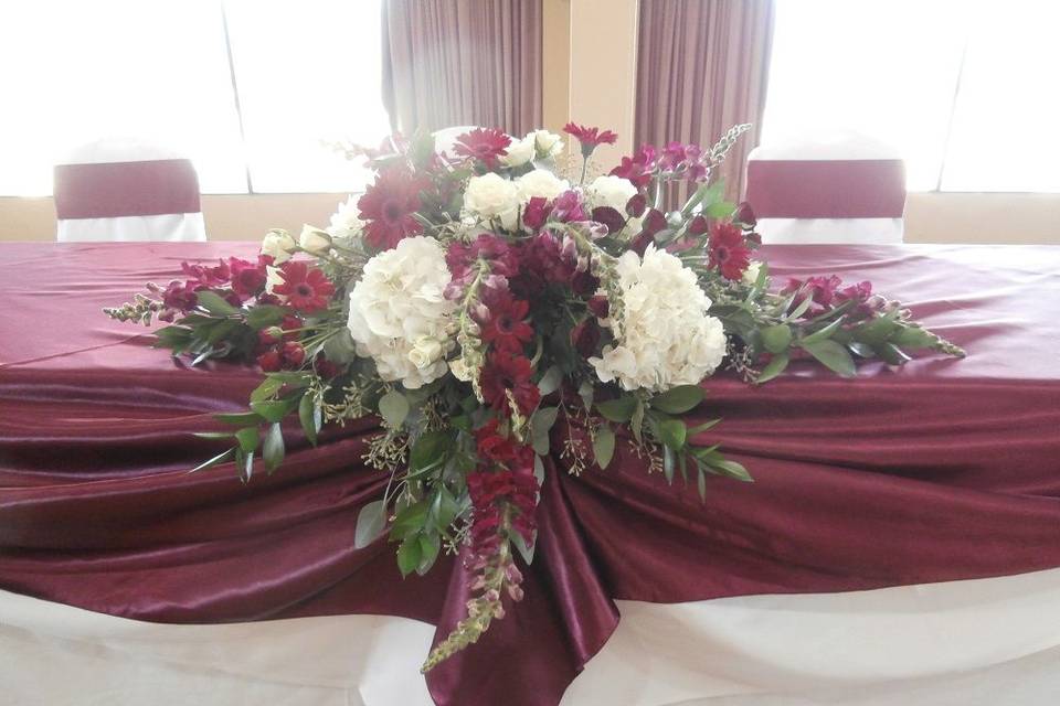 Burgundy and white head bridal table