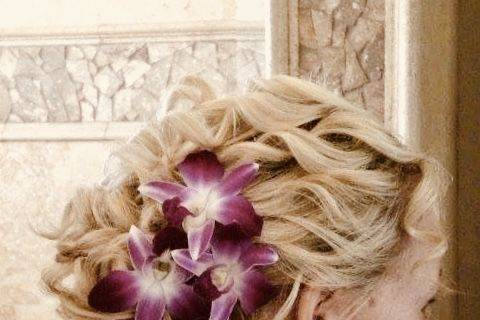 Side updo with purple flowers