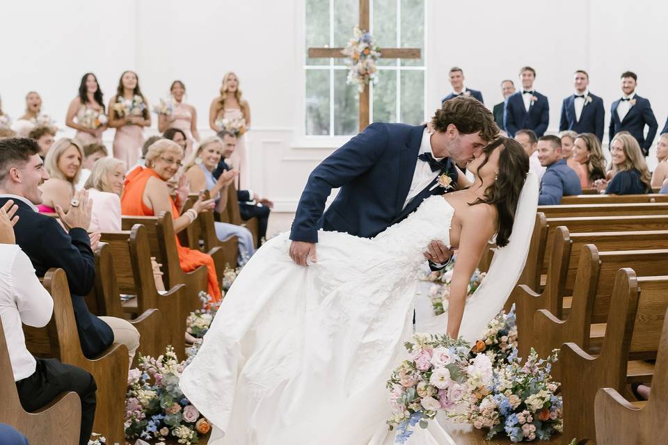 Chapel aisle kiss