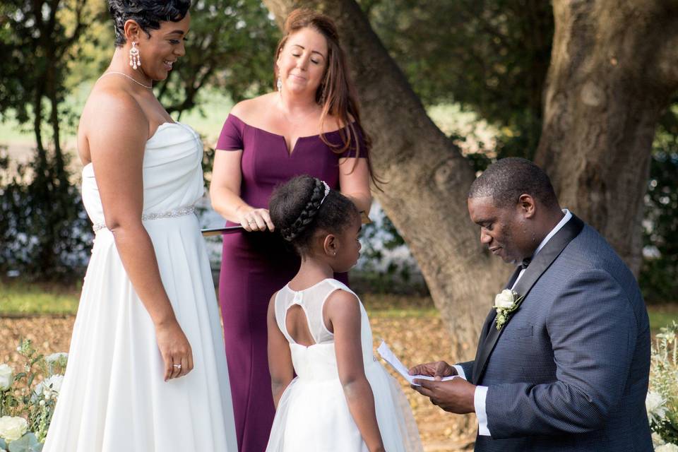 Ceremony under oak tree