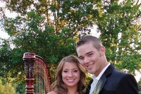 Happy couple, just moments after I played harp for their wedding.