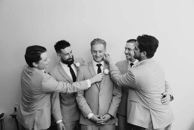 Groomsmen being silly in b&w