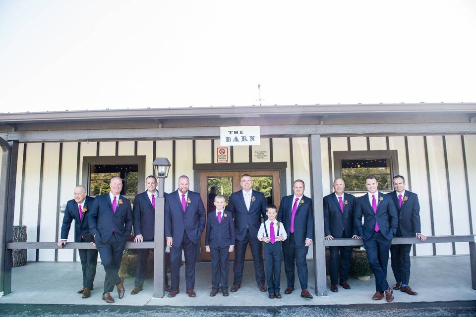 Groomsmen posing at the front