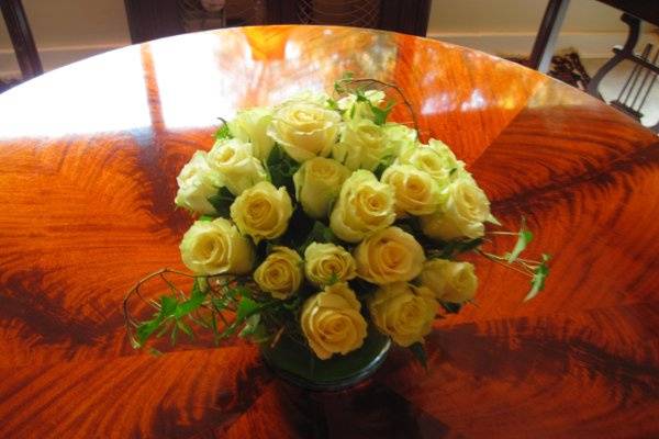 Centerpiece - a profusion of Cream Profitta roses and English Ivy.