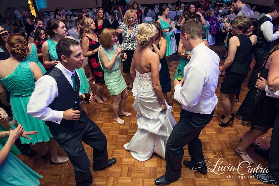 Couple and guests dancing