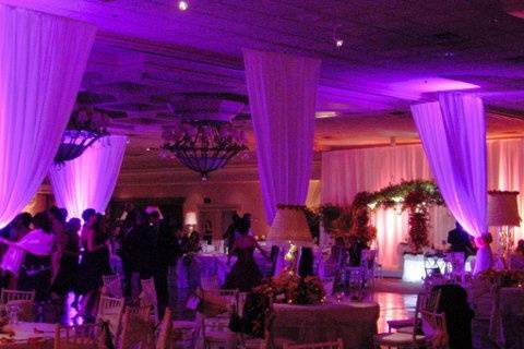 If you are looking for dance floor lighting that is ambiant and elegant, then this is the perfect item for you.  Satin White drape with LED color changers on them to make you dance floor fun and colorful without it being a disco!