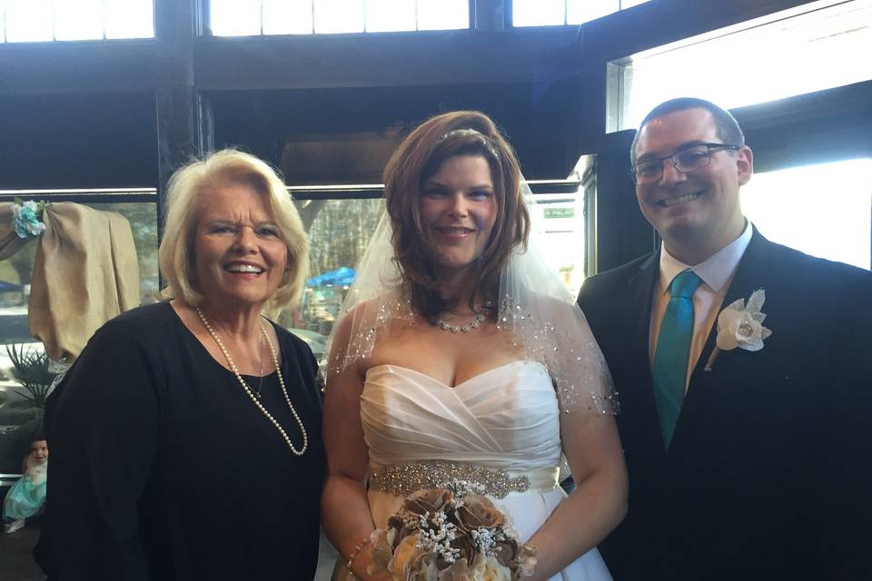 The officiant and the couple