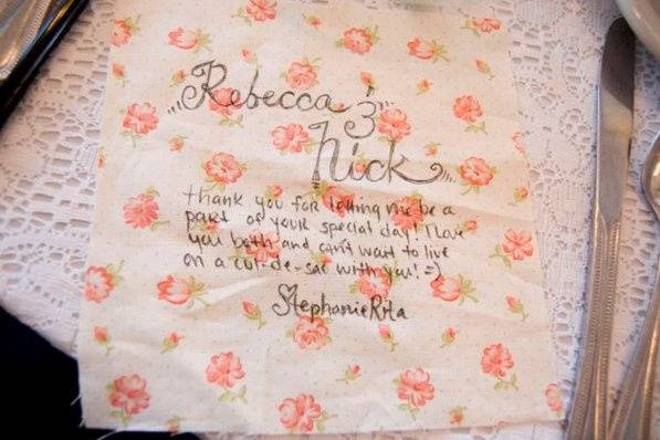 Guests wrote messages to the the happy couple on scraps of fabric to be fashioned into a quilt by the bride's mother.